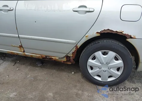 2003 Toyota Corolla Le from USA, damaged, VIN 2T1BR32E83C034335